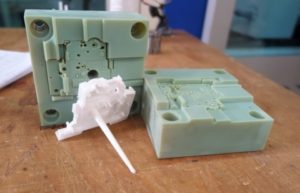 3D printed injection mold with resulting part, produced on a Stratasys Objet Connex 3D Printer